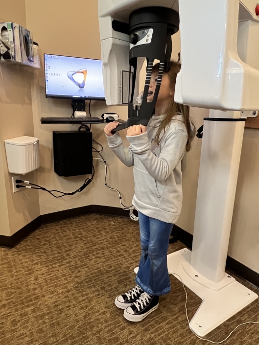Girl getting Cone Beam CT imaging